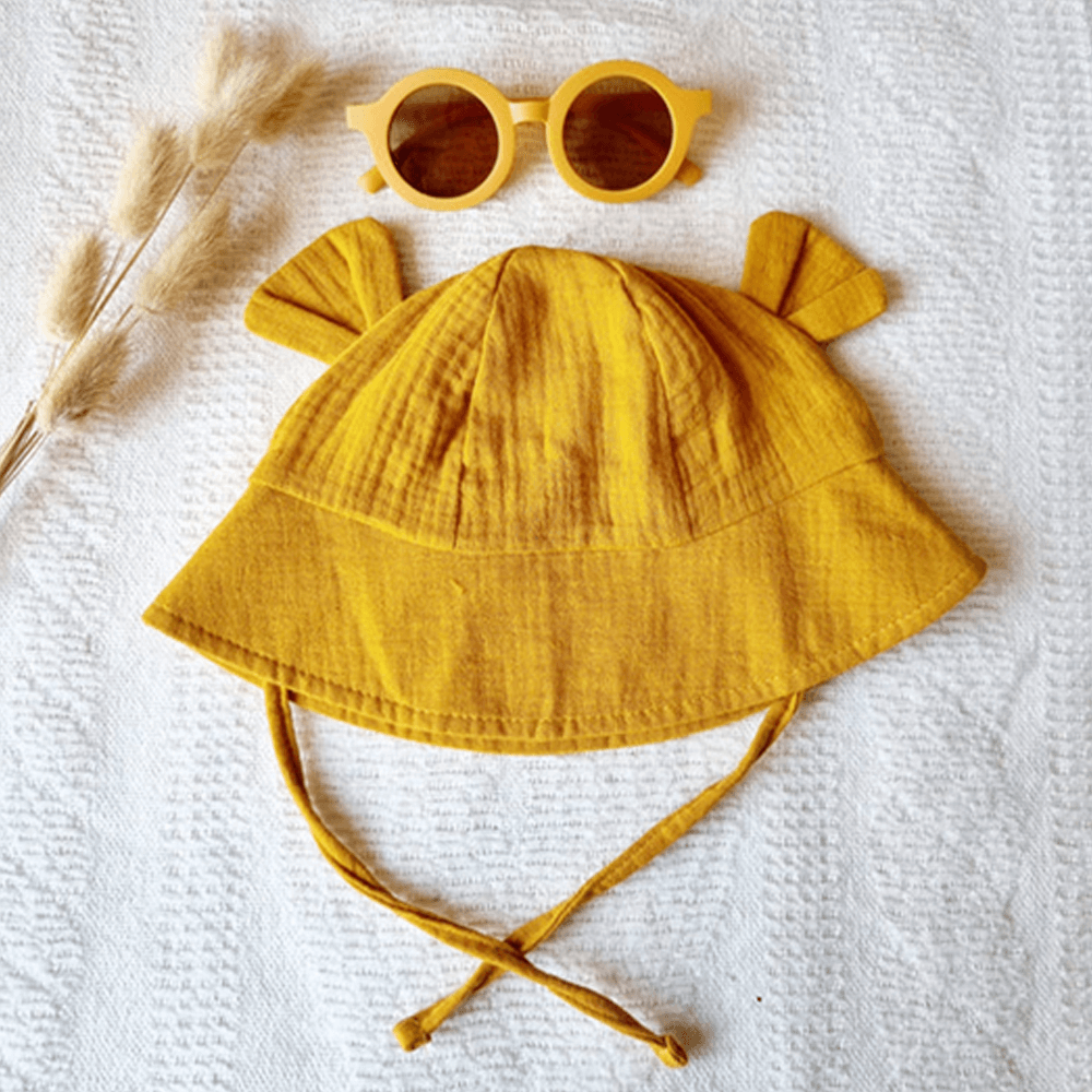 Sbam Design Cappellino alla pescatora per bebè – giallo ocra Spedizione Gratuita